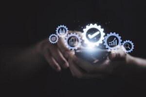 hand touching the best quality assurance with icons on mobile phone for guarantee product and iso service concept free photo