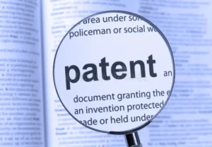 patent highlighted thru magnifying glass 46669316